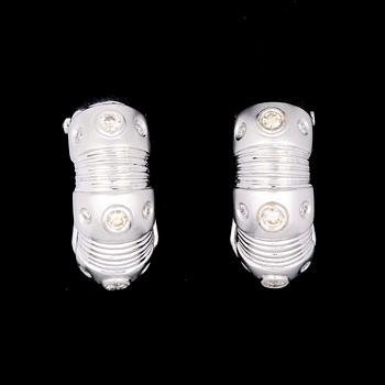 A pair of diamond and white gold earrings, tot. app. 0.50 cts.