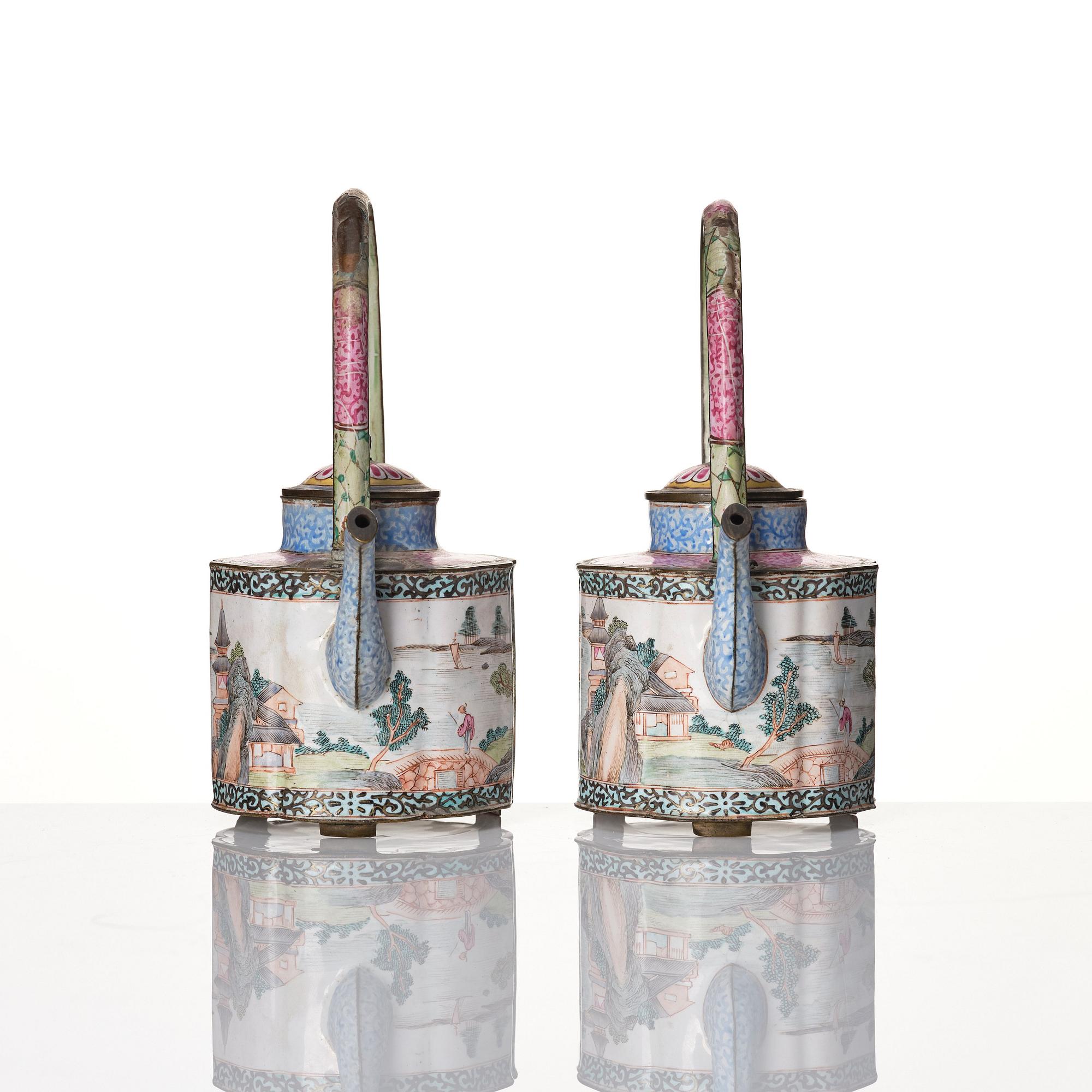 A Chinese pair of enamel on copper tea pots, Qing dynasty, Qianlong (1736-95).