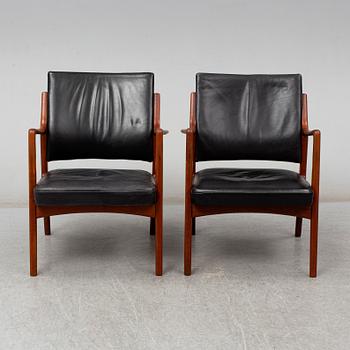 KARL ERIK EKSELIUS, a pair of late 20th Century easy chairs.