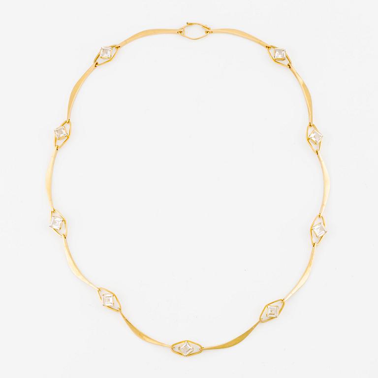 Collier, Öhmans, 18K guld med vita syntetiska stenar.