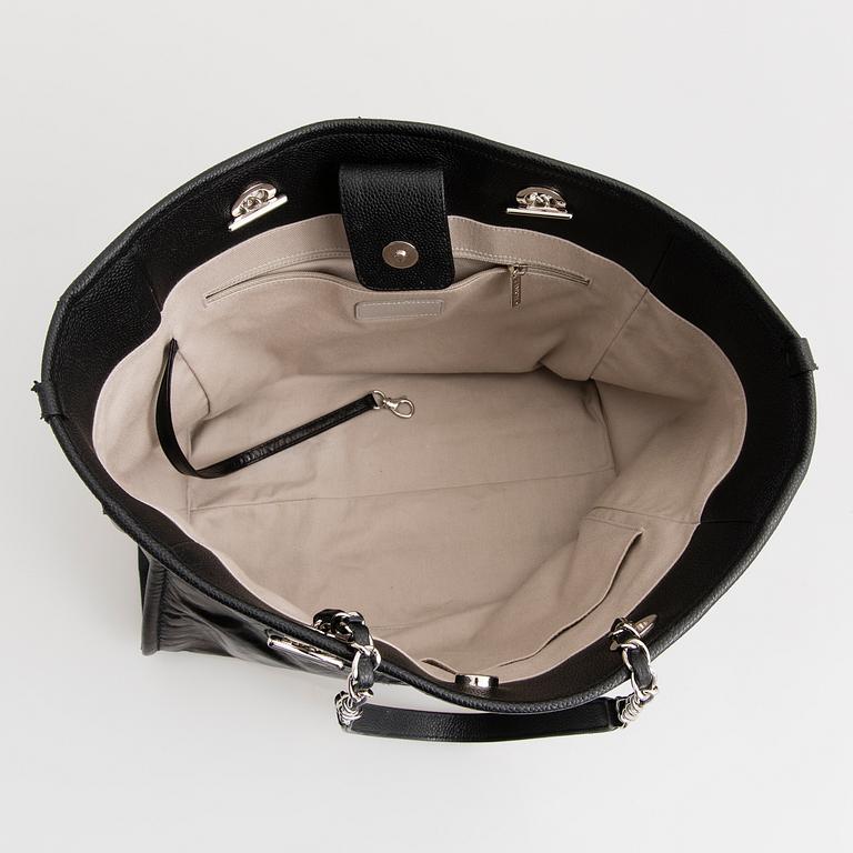 CHANEL, A Large Black Leather Shopping Bag.