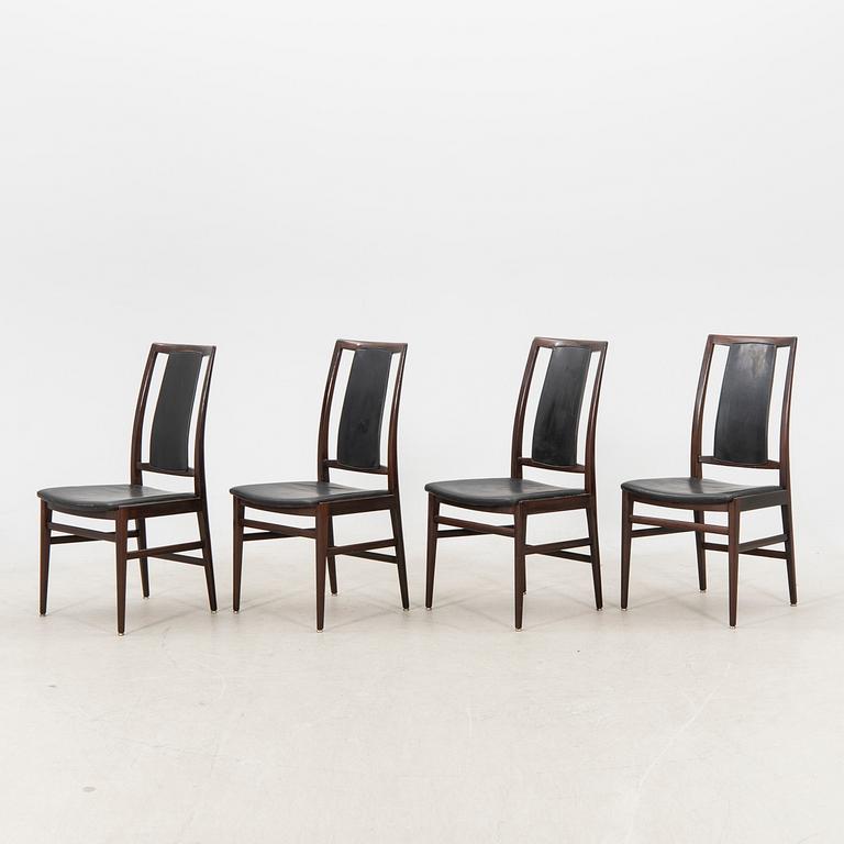 A table and four chairs in lacquered mahogany by David Rosén, "Triva-diné", middle of the 20th century.