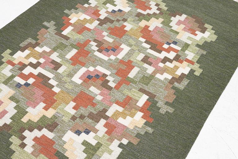 Erik Lundberg, a 'Korall' flat weave rug, c. 217 x 141 cm.