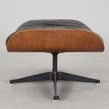 An easy chair and ottoman by Charles & Ray Eames, Herman Miller, USA, produced with licence by Hille, London.