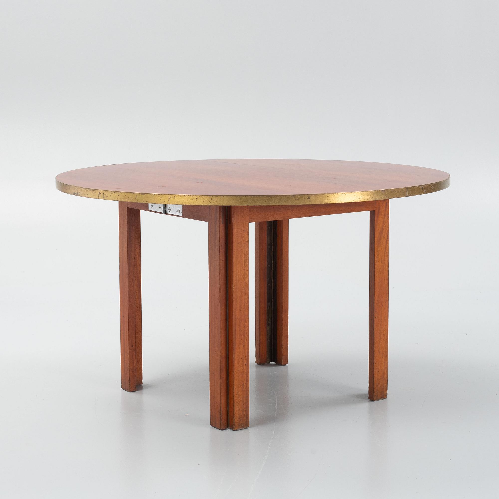 A mid 20th century dining table.