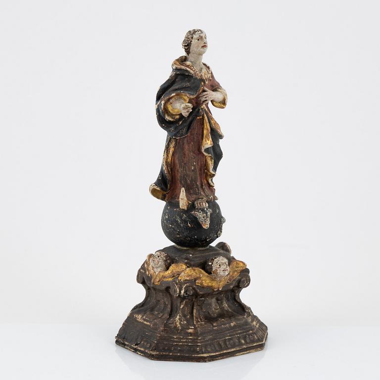 A carved and painted figure of the Virgin Mary crushing the Serpent, Southern Europe, 18th/19th century.