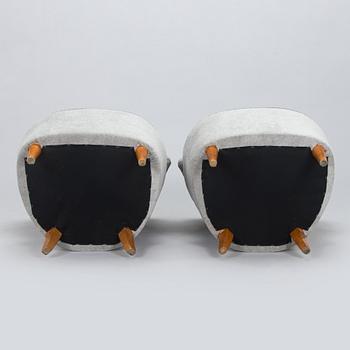 A pair of mid 20th century armchairs.