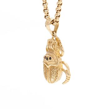 Necklace in 14K gold, with a pendant in the shape of a scarab.