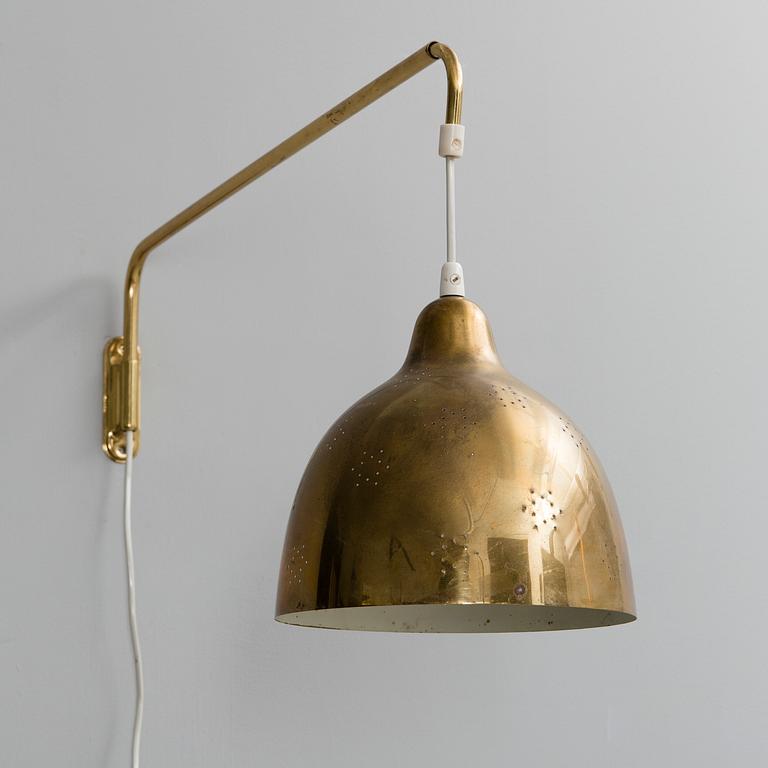 LISA JOHANSSON-PAPE, A WALL LAMP. Manufactured by Orno. 1950s.