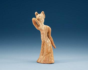 A potted figure of a dancer, Tang dynasty (618-907).