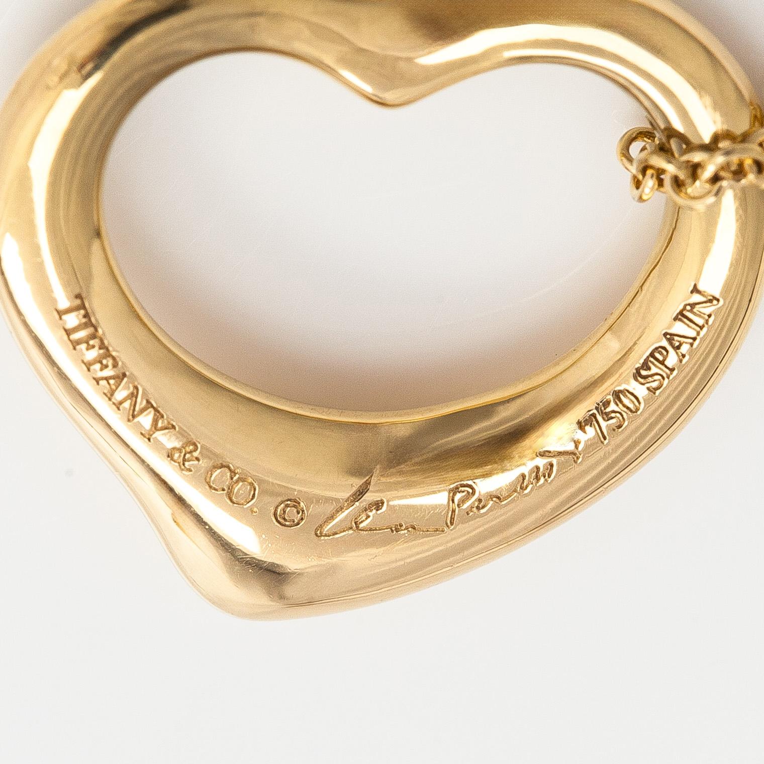 Tiffany & Co, Elsa Peretti, an 18K gold "Open Heart" necklace.