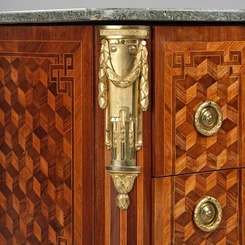 A Louis XVI rosewood and amaranth marquetry ormolu-mounted commode by Leonard Boudin (master in Paris 1761).