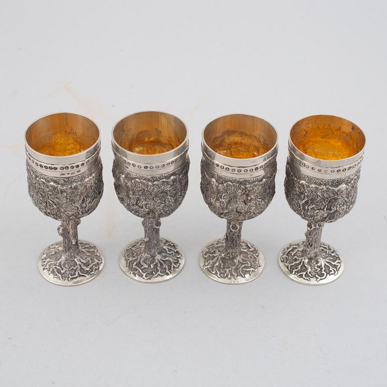 E.Jäntti, four silver cups, a three-piece silver coffee service and a silver tray, Helsinki, Finland,1979-81.