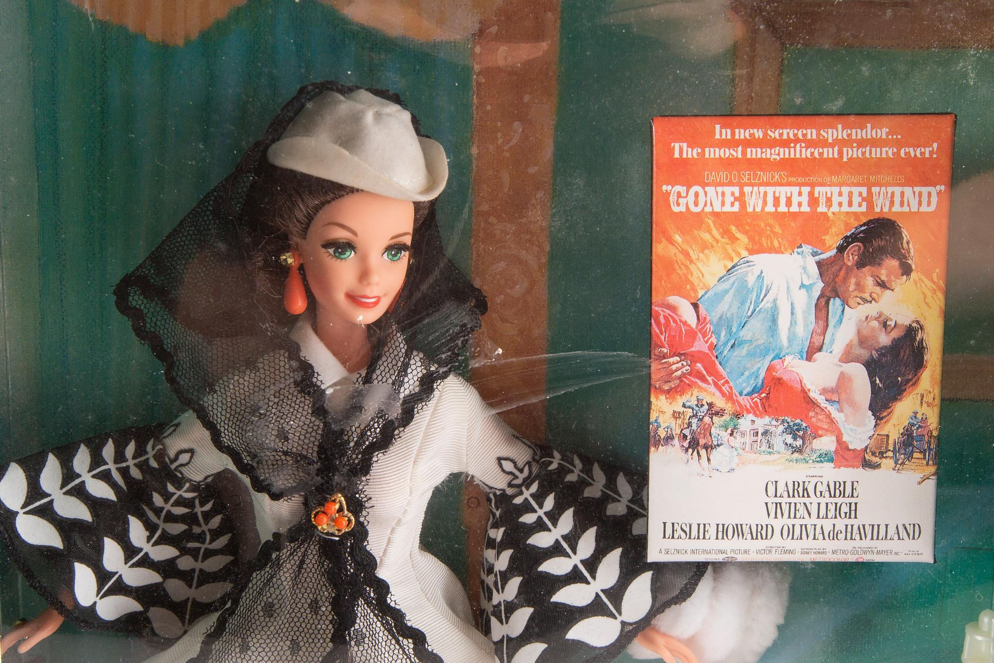 A set of four 1990s Barbie and Ken dolls Mattel.