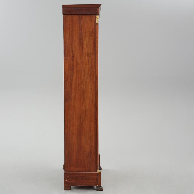 A French Empire mahogany and gilt-bronze mounted bibliothèque, early 19th century.