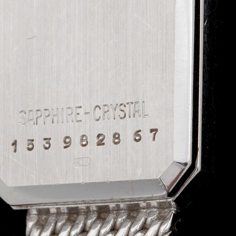 DAMARMBANDSUR, Certina, 18k vitguld med krans med åttkantsslipade diamanter tot 0,20ca. Tot vikt 28g.