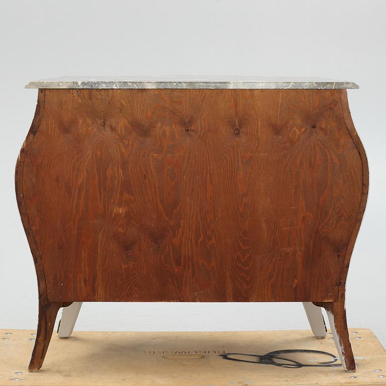 A Rococo style chest of drawers, mid-20th Century.