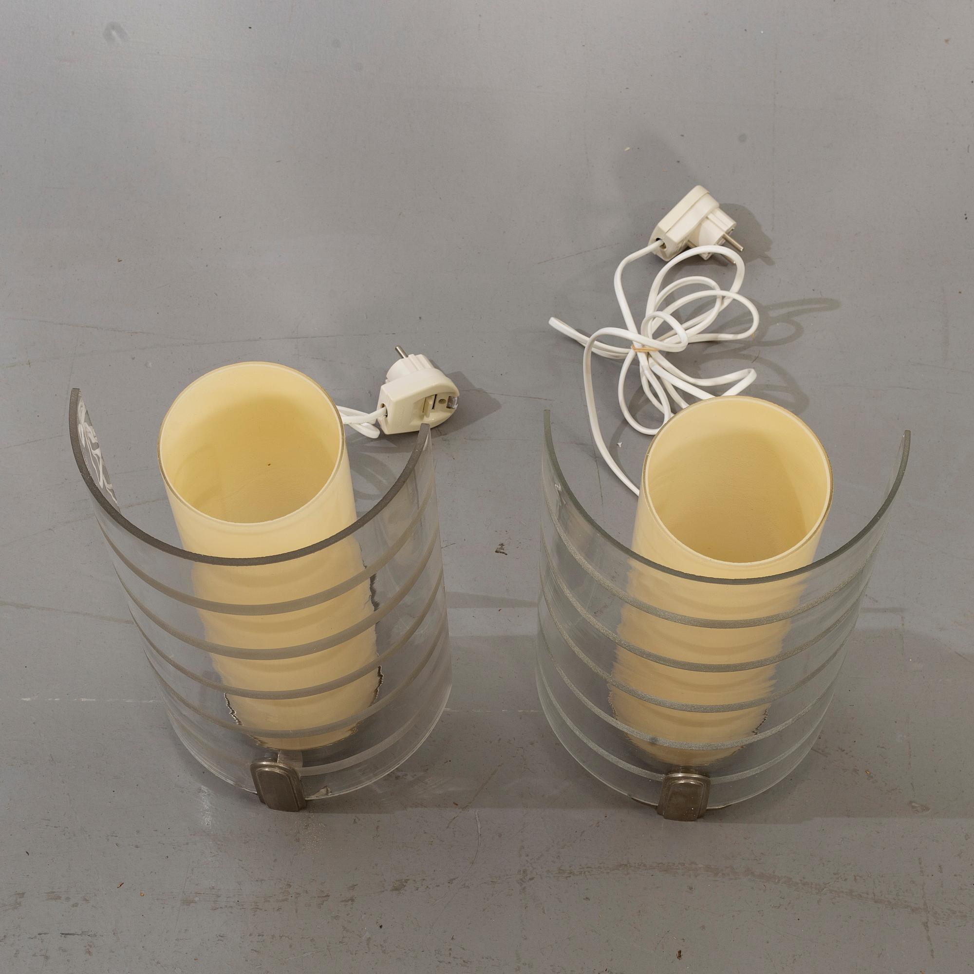 A pair of Swedish Art Deco wall lamps.