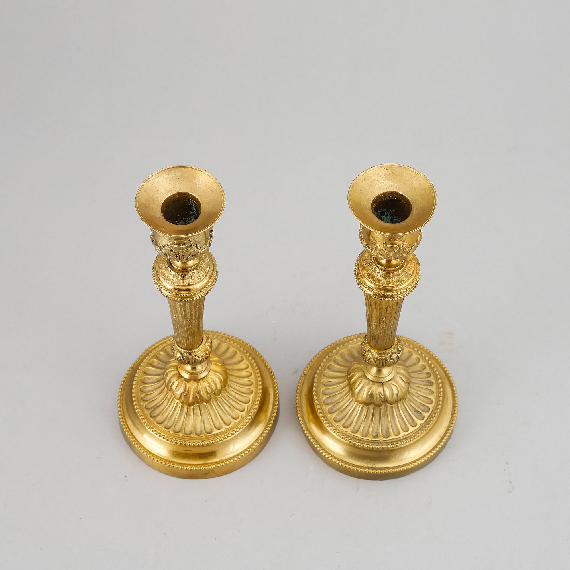 A pair of Louis XVI-style candlesticks, ca 1900.