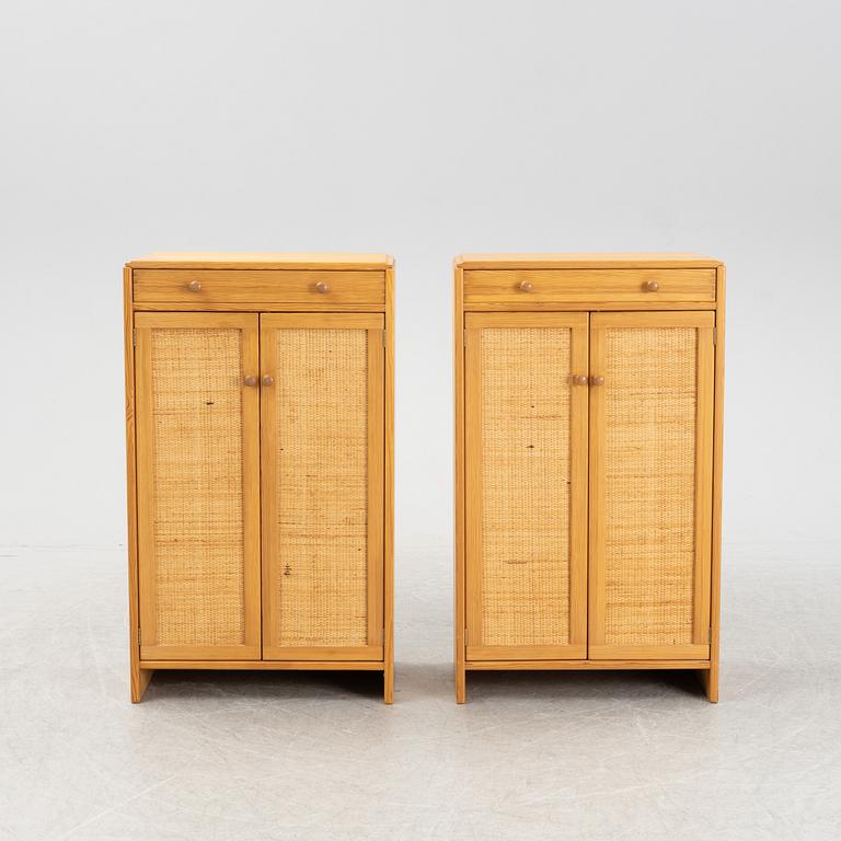 Yngve Ekström, two 'Furubo' pine and rattan cupboards, Swedese, mid 20th century.