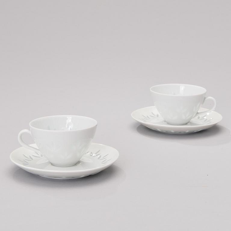 A set of twelve porcelain espresso cups with saucers, signed F.H.Kj. Finland Arabia.