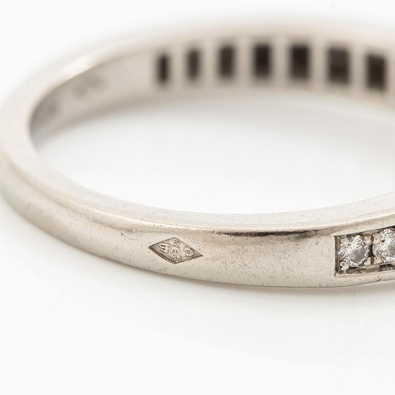 Cartier two rings platinum with round brilliant-cut diamonds.