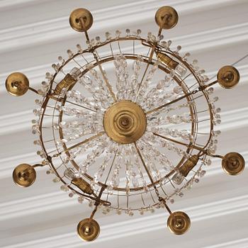 A late Gustavian nine-light gilt brass and cut glass chandelier, Stockholm, late 18th century.