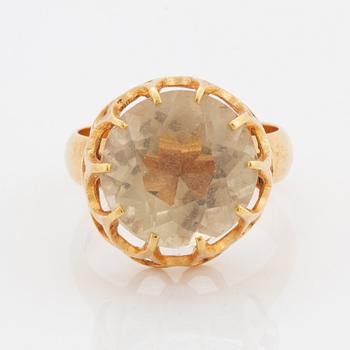 Ring, 18K guld med rund fasettslipad citrin.
