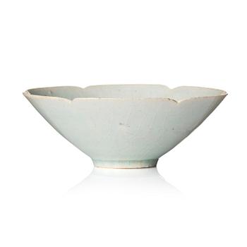 A small qingbai foliate cup, Song dynasty (960-1279).