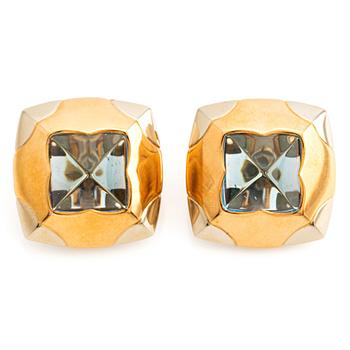 500. A pair of 18K gold Bulgari "Pyramid" earrings with sugarloaf shaped topaz.