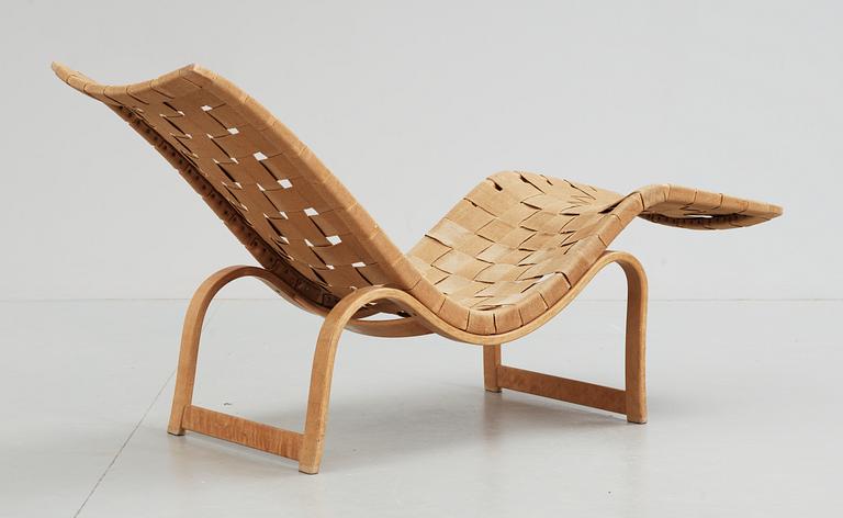 A Bruno Mathsson birch and canvas reclining chair, by Karl Mathsson, Värnamo 1936.