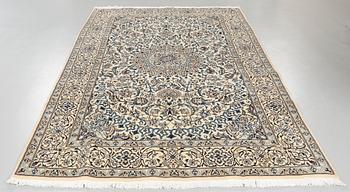 A NAIN PART SILK RUG, 306 x 191 cm.