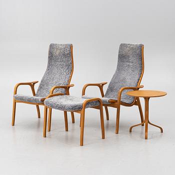 Yngve Ekström, A pair of armchairs, a footstool, “Lamino”, and a side table, Swedese, 2000s.