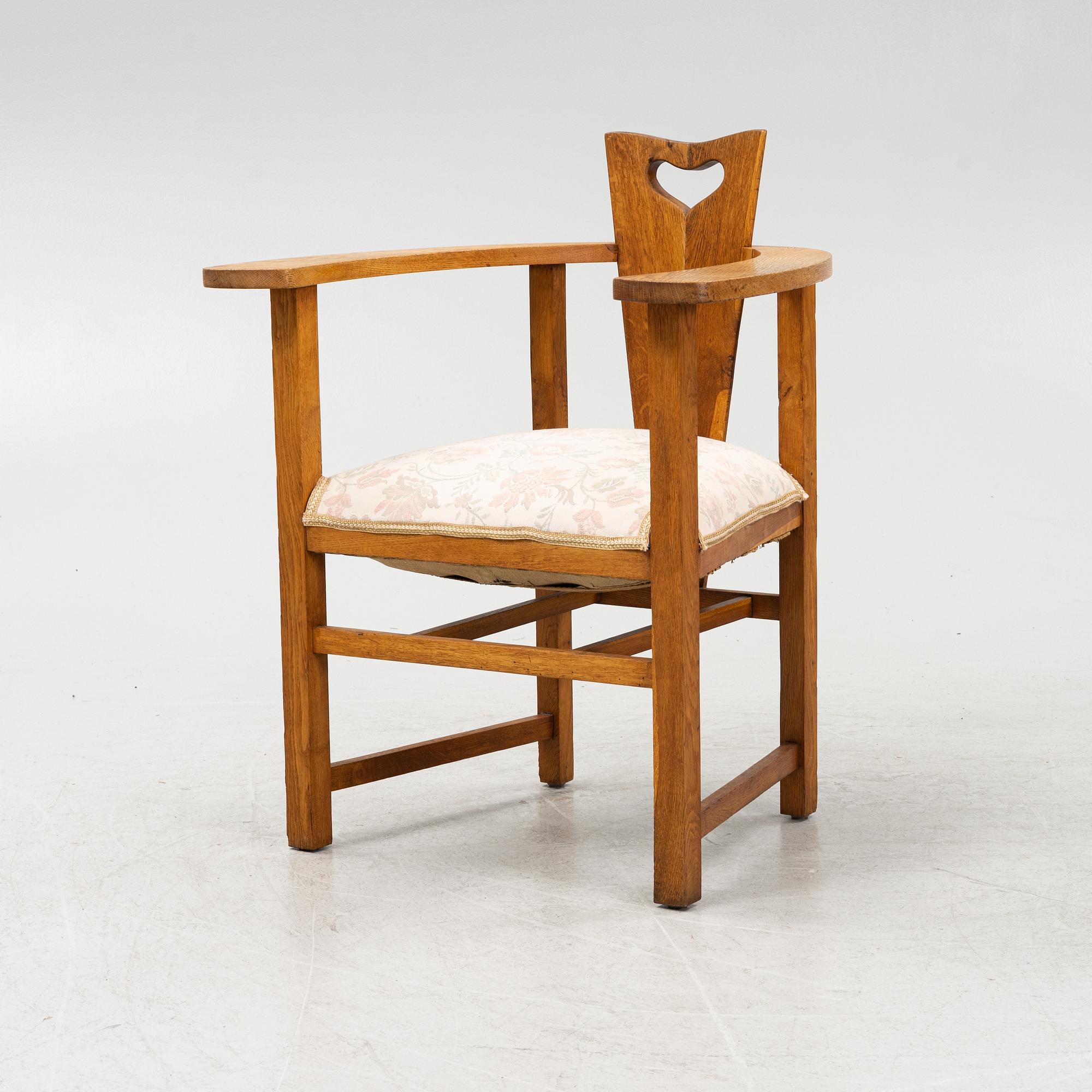 An oak Arts and Crafts armchair, early 20th century.