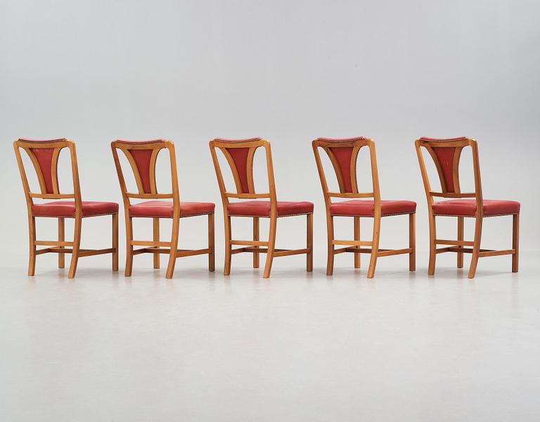 Josef Frank, a set of five walnut and red leather dining chairs, Svenskt Tenn, model 2229, mid 20th century.