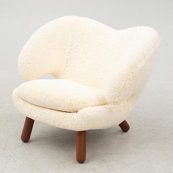 Finn Juhl, a' Pelican Chair' armchair, House of Finn Juhl, Denmark.