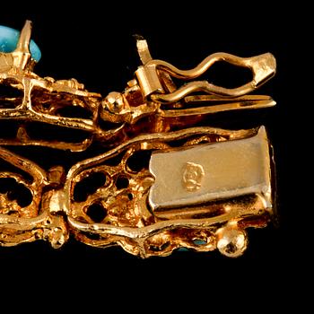 ARMLÄNK, 18k guld med 11 cabochonslipade turkoser, utländska stämplar. Vikt 20 g.
