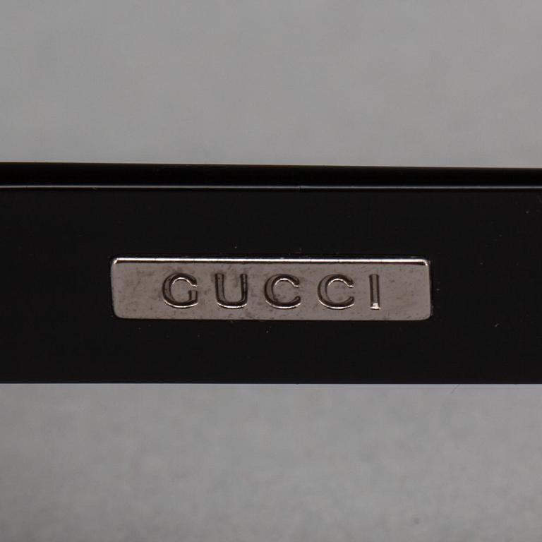 SOLGLASÖGON, Gucci.