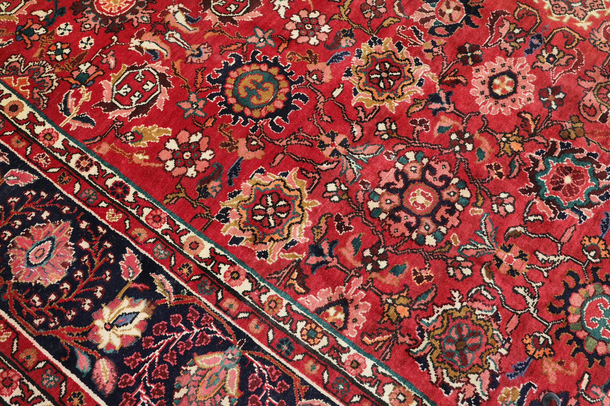 A Nanadj carpet, approx. 407 x 313 cm.