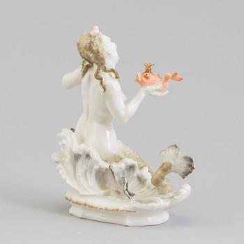 A Hutschenreuter figure of a mermaid with a fish prince, Germany, 1955-68.