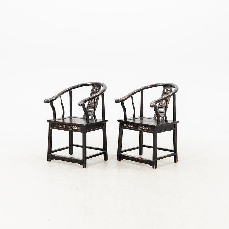 A pair of Chinese armchairs later part of the 20th century.