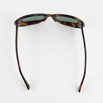 Oliver Goldsmith, a pair of "Uuksu" sunglasses.