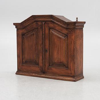 A Swedish wall cabinet, 18th century.