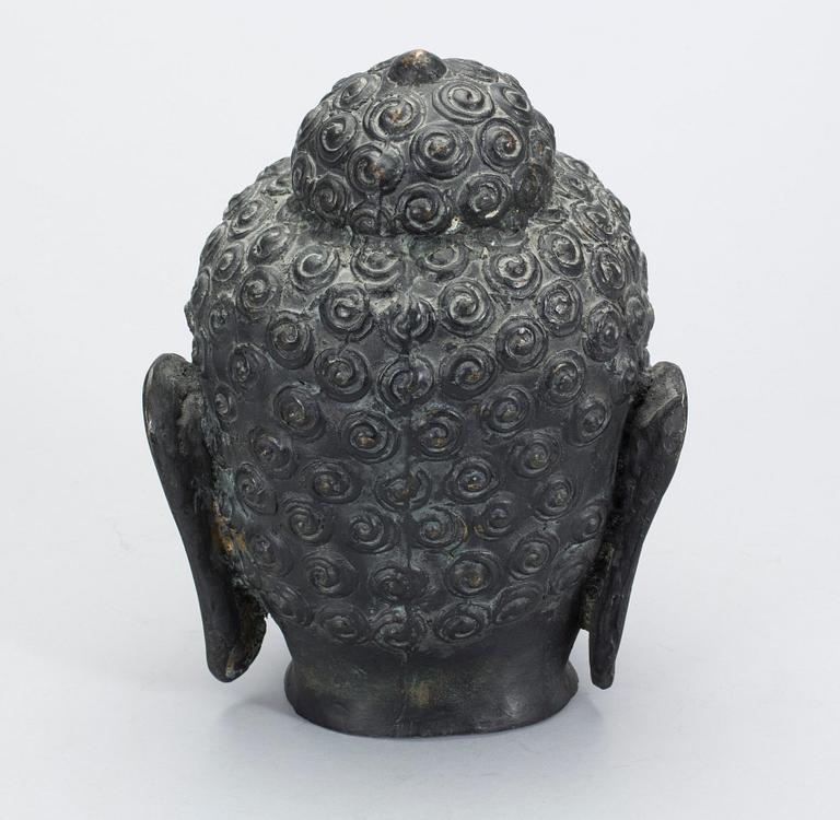 SKULPTURHUVUD, metall, "Buddha" 1900-tal.