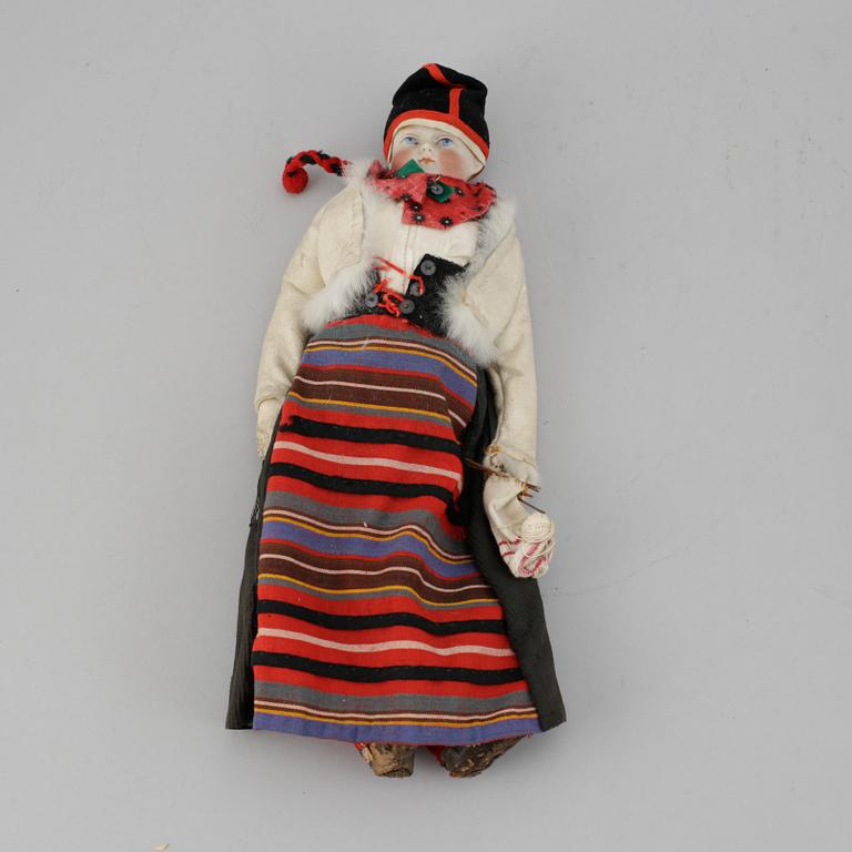 A circa 1900 bisque head doll.