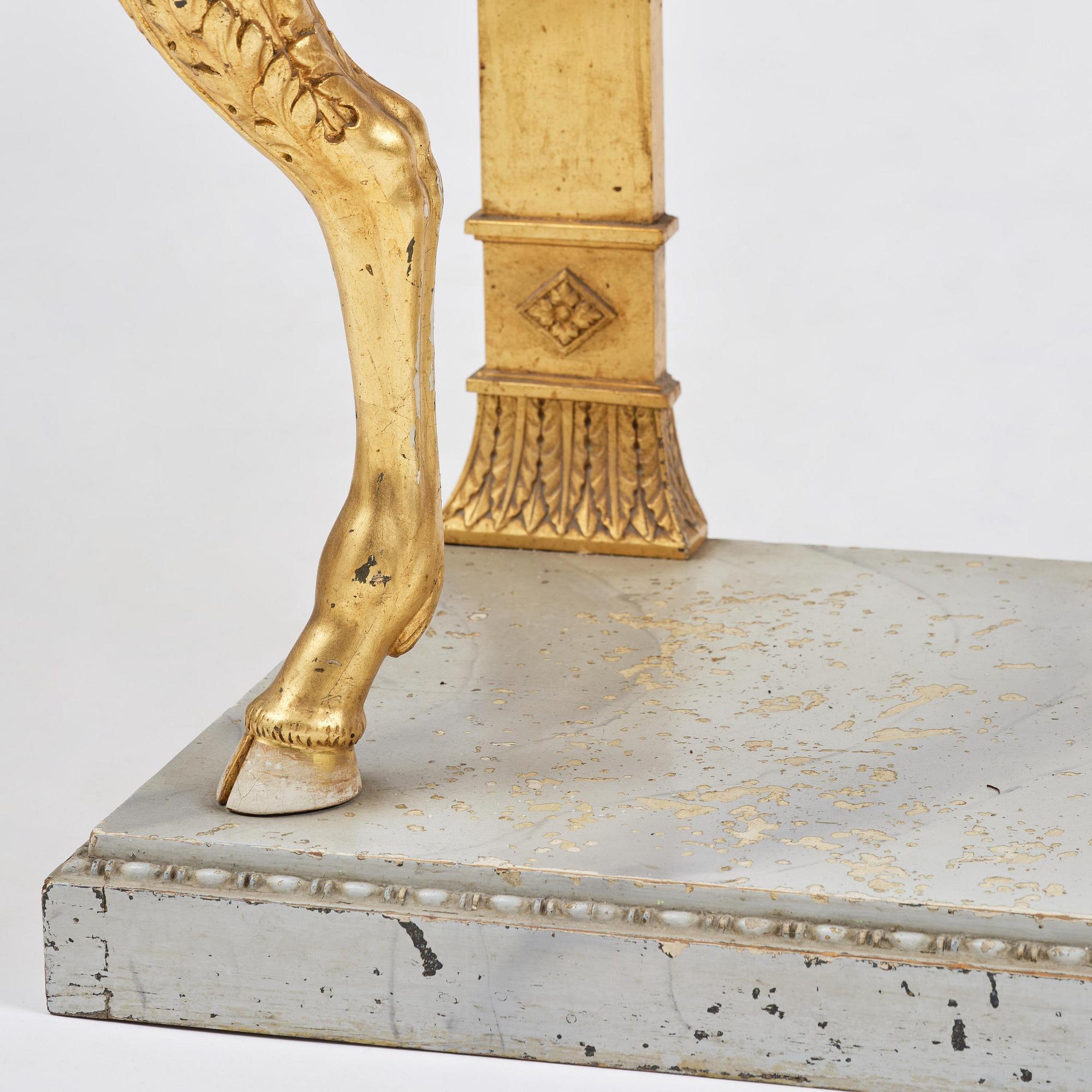 A late Gustavian giltwood console in the manner of J. Frisk, Stockholm, early 19th century.