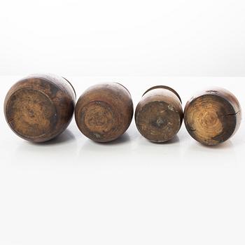 A set of four turned folk art jars, 19th century.
