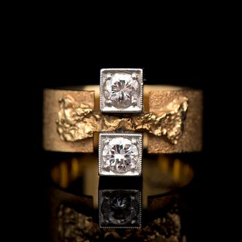 A BJÖRN WECKSTRÖM RING, "Diamond bridge", brilliant cut diamonds, 18K gold. Lapponia 1969.