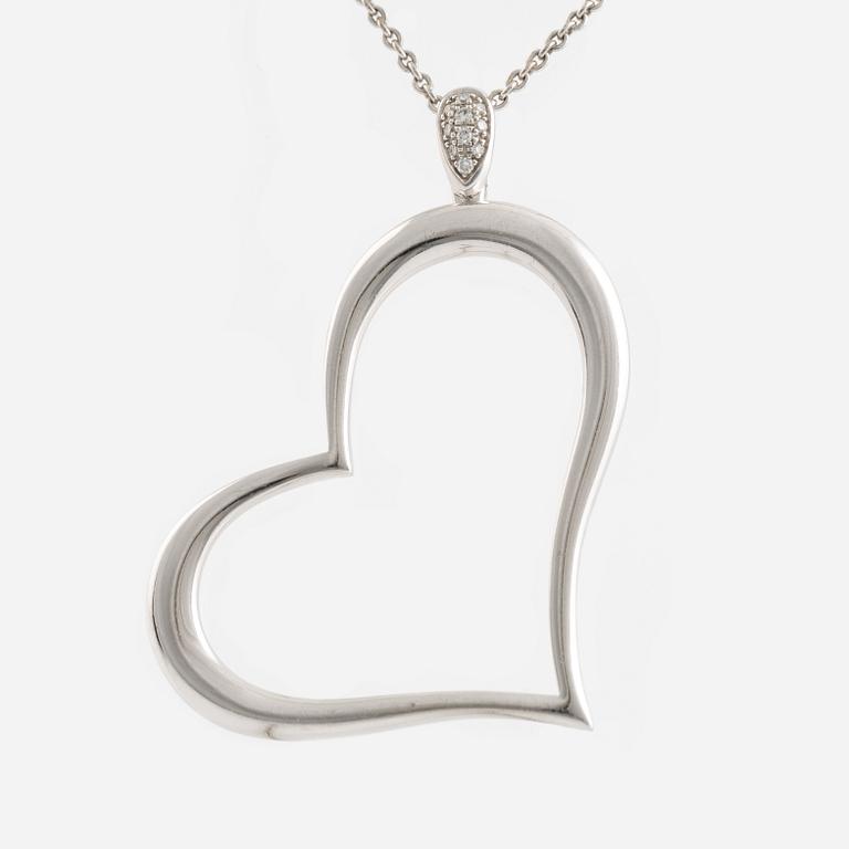 Piaget, 18K white gold and brilliant cut diamond heart necklace.