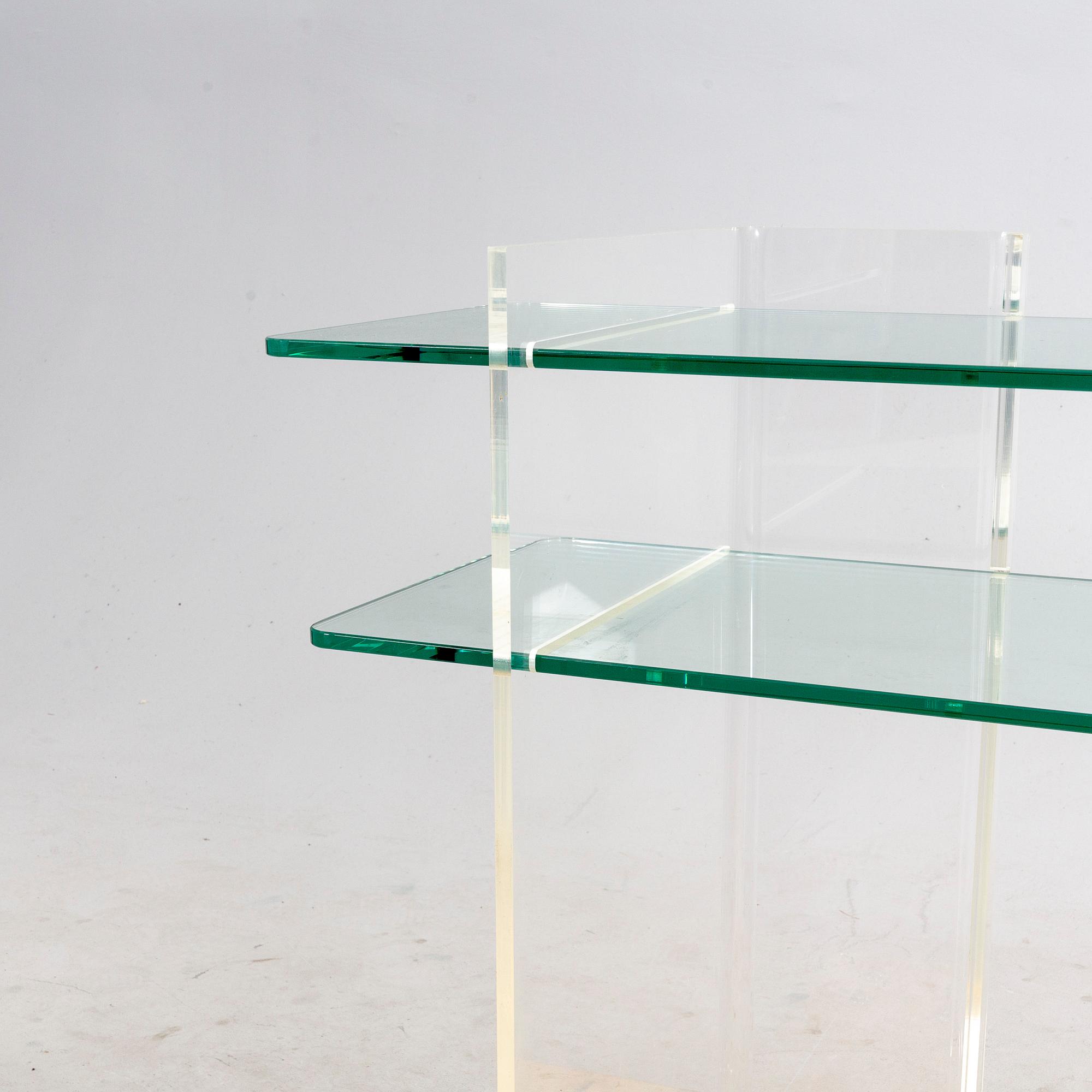 A late 20th century plexi and glass sideboard.